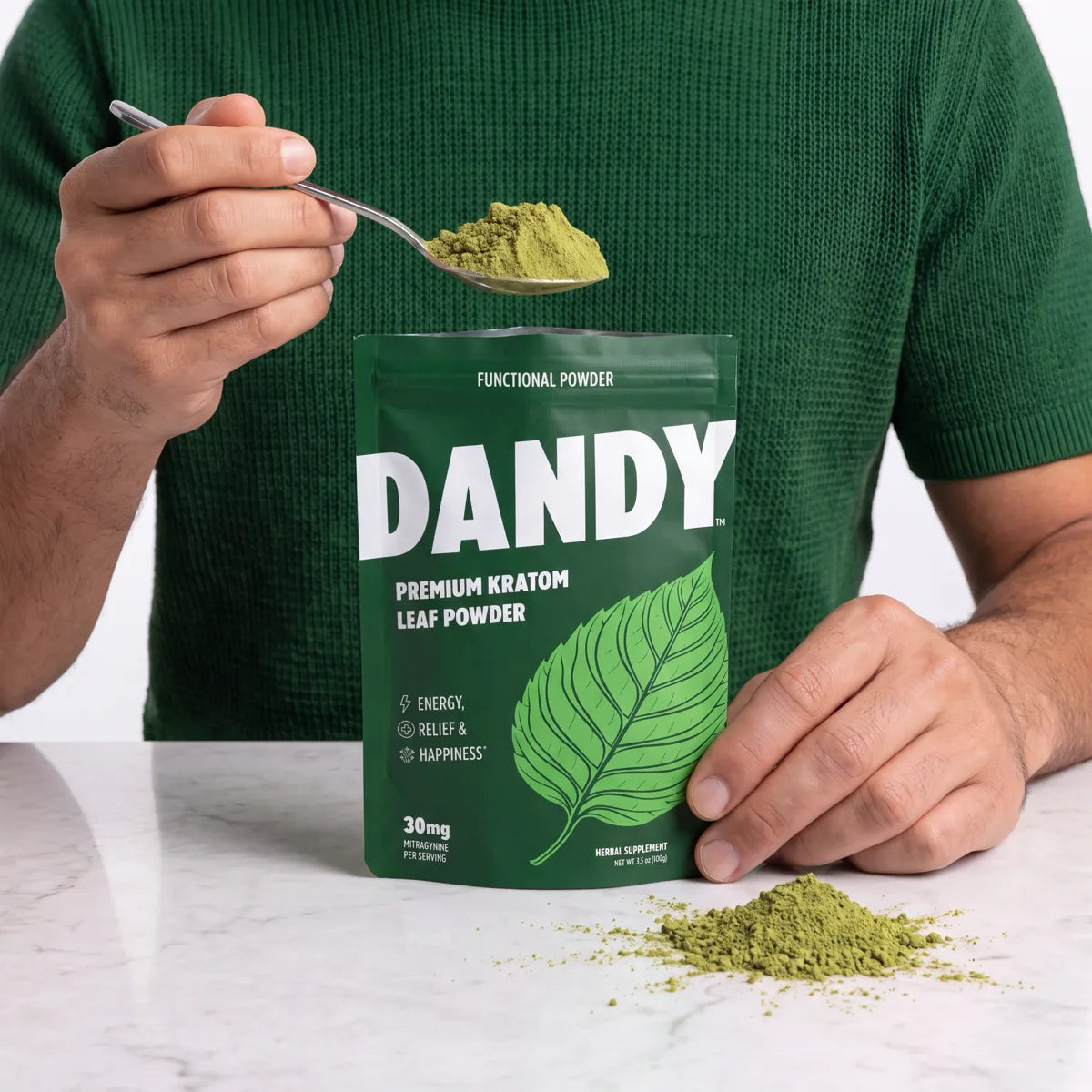 Dandy leaf powder pouch with a scoop of powder